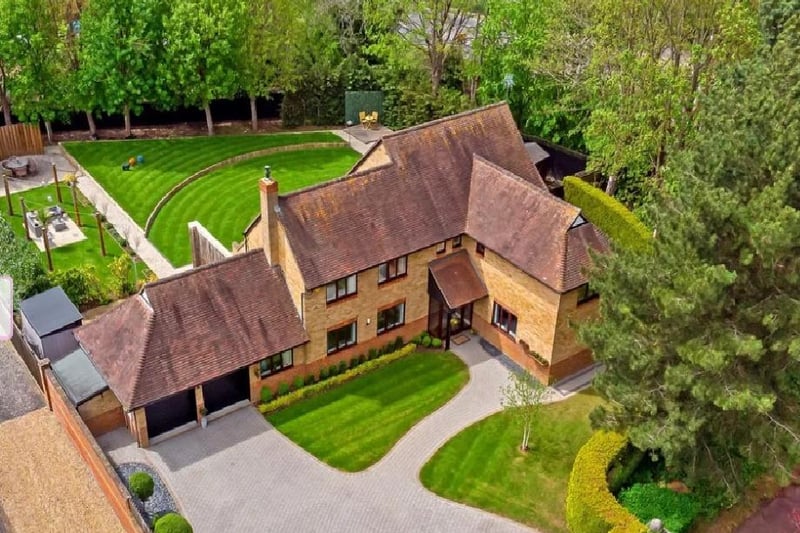 This aerial shot of the property helps showcase the amount of land and private garden space a new owner would inherit.