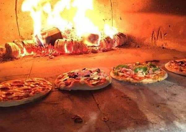 How do you like your pizza - wood fired like at Pizza Parlour and Music Cafe? QqJ-_FqaYZ-zh1a_aD4M