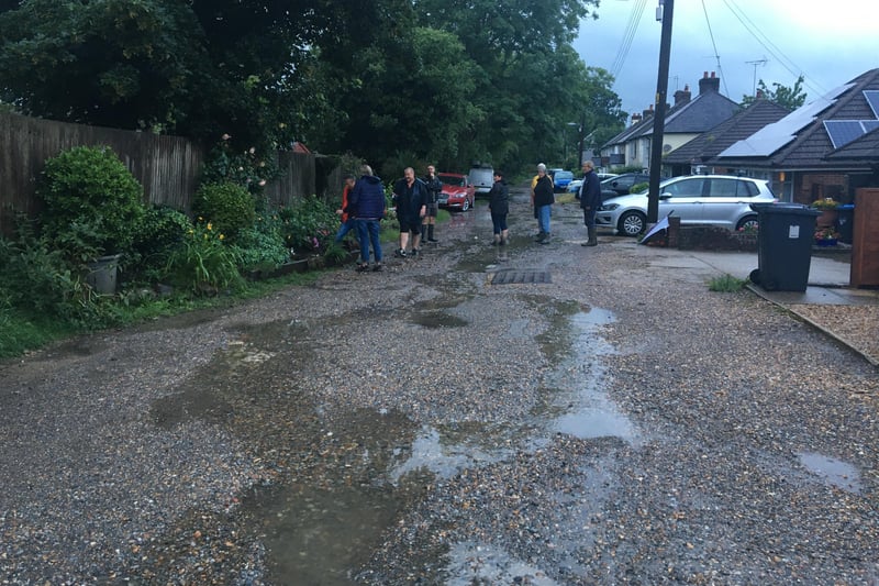 Freeks Lane residents outside after the flood.