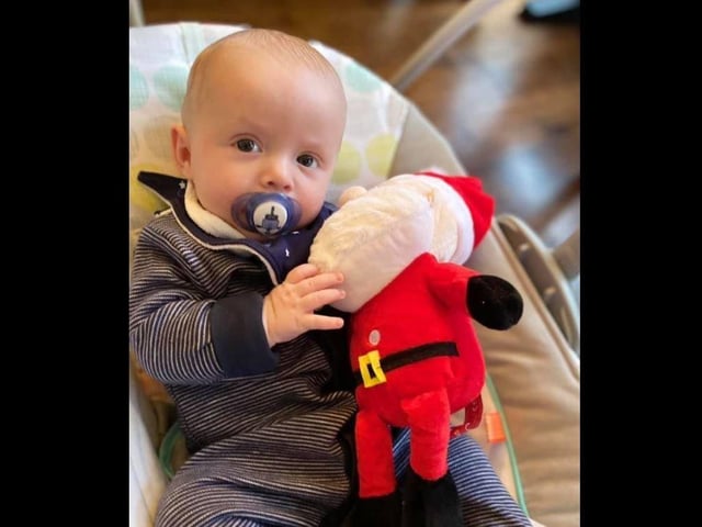 Gemma Gill - Eoin Gills first Christmas. Hes 18 weeks old on Monday. Hes listening to Santa.