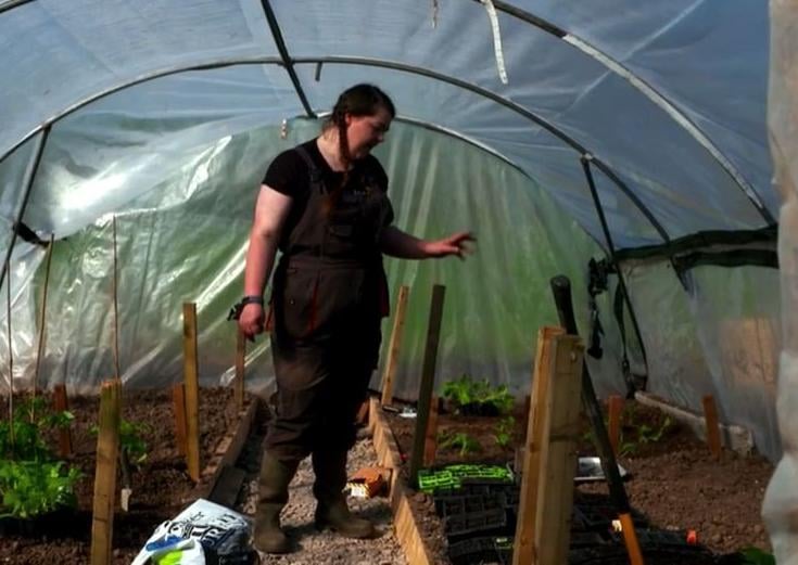 Margaret Little showing off the new poly tunnel