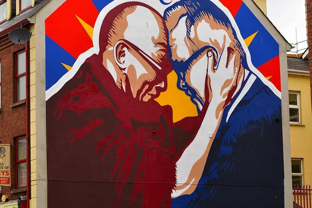 A new mural at Great James Street, created by local artists UV Arts, depicts the friendship between His Holiness the Dalai Lama and Derry local man Richard Moore.  DER2105GS – 01