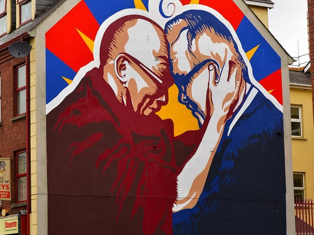 A new mural at Great James Street, created by local artists UV Arts, depicts the friendship between His Holiness the Dalai Lama and Derry local man Richard Moore. DER2105GS – 01