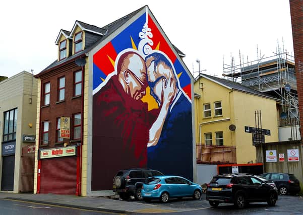 A new mural at Great James Street, created by local artists UV Arts, depicts the friendship between His Holiness the Dalai Lama and Derry local man Richard Moore.  DER2105GS – 03