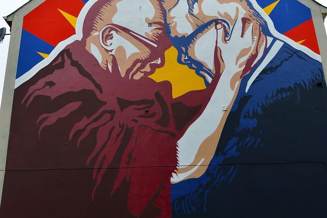 A new mural at Great James Street, created by local artists UV Arts, depicts the friendship between His Holiness the Dalai Lama and Derry local man Richard Moore.  DER2105GS – 05