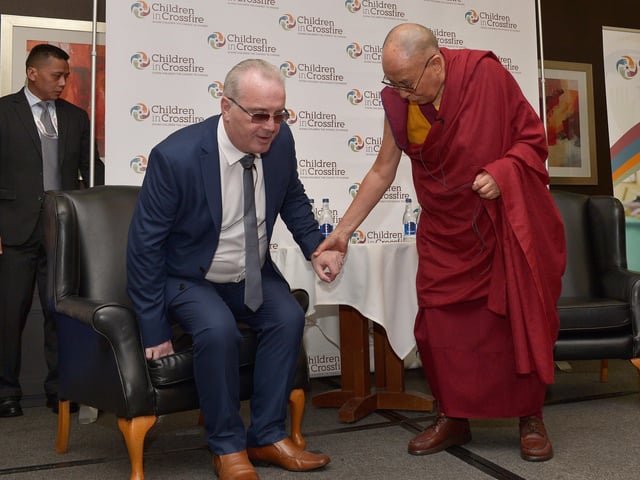 2017: Tibetan spiritual leader the Dalai Lama pictured with Richard Moore at the City Hotel. The Dalai Lama is the patron of the Children in Crossfire charity, founded by Richard Moore. The visit to the city was to marked the organisation’s 20th anniversary. DER3717GS003