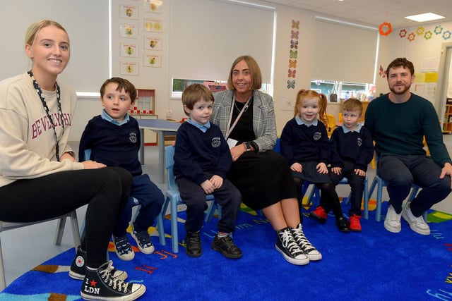 Ms Kerri McCrossan’s (centre) P1 class at Ardnashee Primary School. Included in the photo are Shannon Henderson and Eoghan Neachtain. DER2140GS – 015