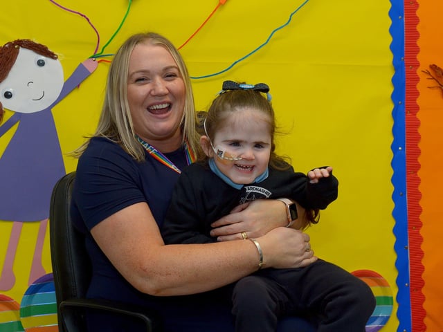 Ms Brid Cutliffe pictured with her P1 pupil Harlee at Ardnashee Primary School. DER2140GS – 018