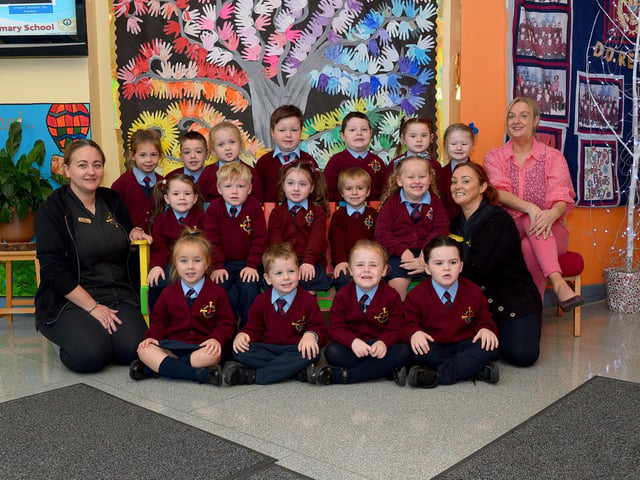 Mrs Logue (on the right) teacher and Miss Carr and Miss McCloskey, classroom assistants with their Primary 1 class at St Eithne’s PS. DER2139GS - 032