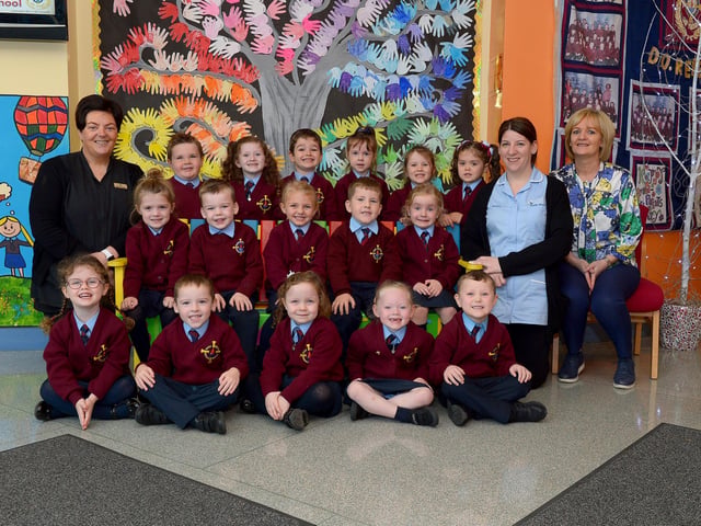 Mrs Flanghan (on the right) teacher and Mrs Cregan and Miss Warren, classroom assistants with their Primary 1 class at St Eithne’s PS. DER2139GS - 033