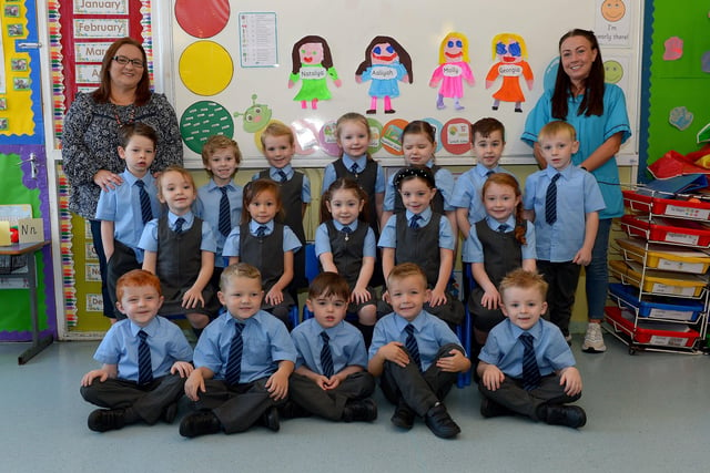 St Anne’s Primary 1 class pictured with Mrs Organ, teacher (on the left) and Mrs McBay teaching assistant.  DER2139GS - 013