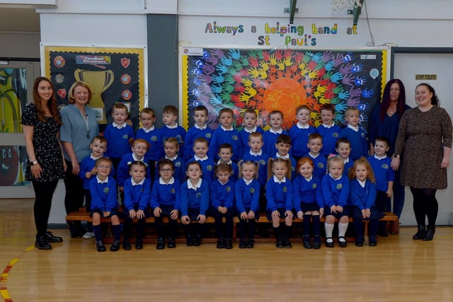 St Pauls Primary 1 class with teaching assistants Miss Foley and Mrs McElhinney on the left and Mrs Csrlin, teaching assistant, and Miss Fox , teacher.  DER2137GS - 007