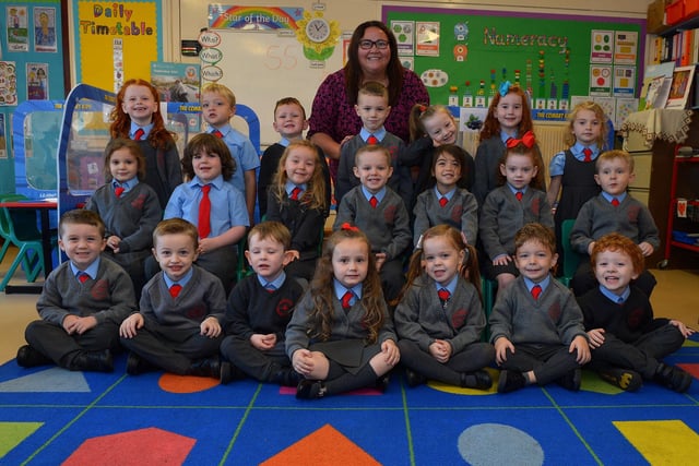 Miss Glenn pictured with her St Brigid’s Primary 1 class.  DER2137GS - 010