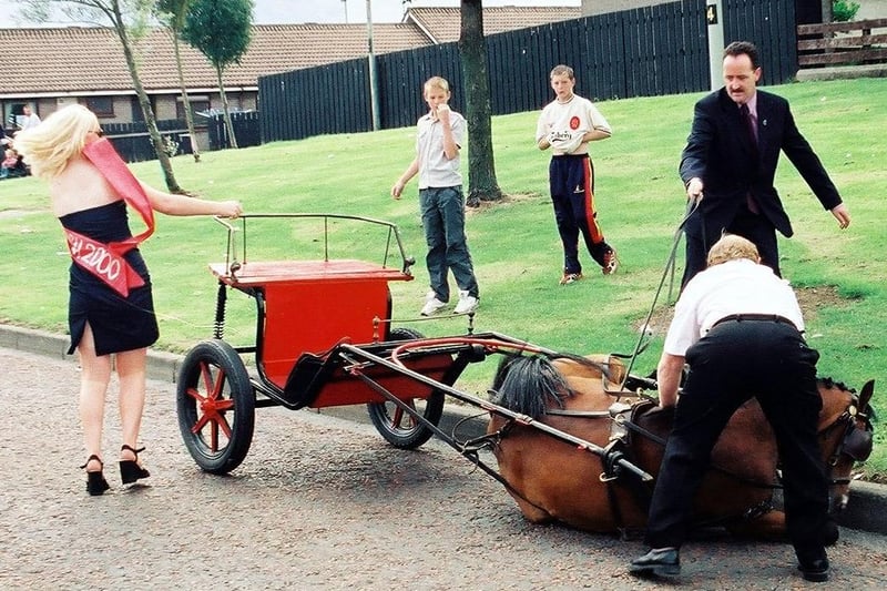 Horse tumbles beside Mayor Crumley and Miss Galliagh 2000.