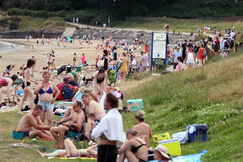 Hundreds of people pictured enjoying the good weather at Helen's Bay.