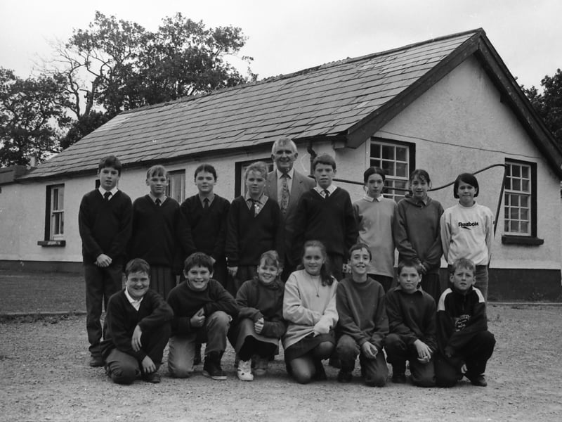One of the last senior classes of St. Patrick’s National School, Drumfries, pictured outside their old schoolhouse which was opened in 1838.