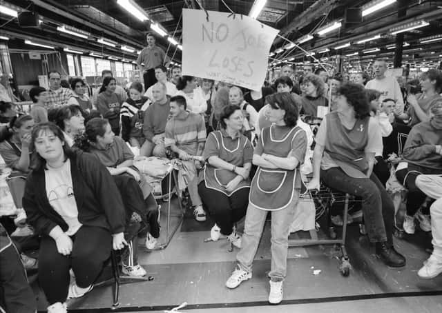 The scene when workers at the crisis torn Coats Viyella factory at Maydown ceased production during a management meeting.