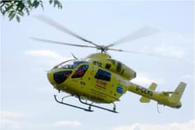 The air ambulance landed at the scene near Warmsworth.