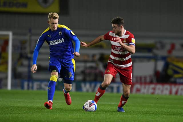 Ben Whiteman surges forward on the ball. Picture: Howard Roe/AHPIX