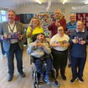 Sean Gibbons, Managing Director of Food AWARE CIC, hands out the Easter eggs.