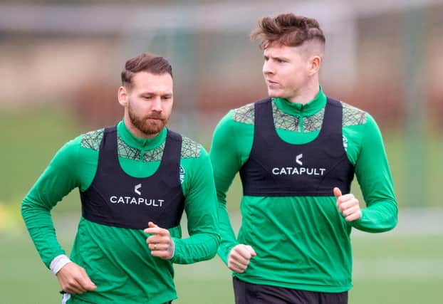 EDINBURGH, SCOTLAND - NOVEMBER 11 : Martin Boyle (L) and Kevin Nisbet during Hibs training at HTC, Tranent, on November 11, 2020, in Edinburgh, Scotland (Photo by Mark Scates / SNS Group)