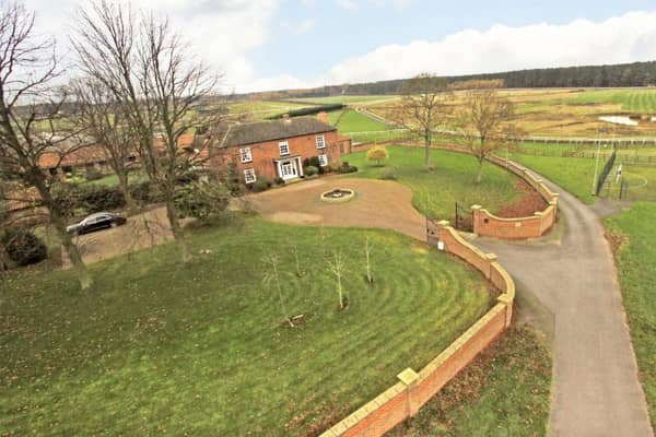 The complex includes a six-bedroom house, detached staff cottage and equestrian facilities including extensive stabling standing in excess of 35 acres in all.