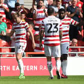 Doncaster's Kyle Hurst celebrates scoring his second goal against Salford City last weekend.