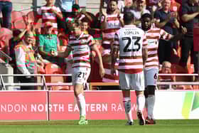 Doncaster's Kyle Hurst celebrates scoring his second goal against Salford City last weekend.