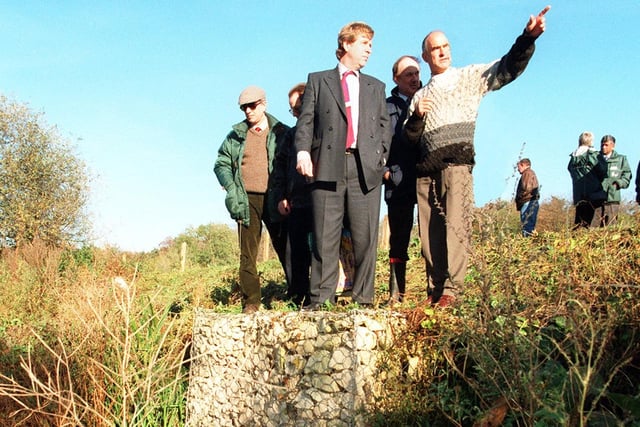 Hugh Becker, chairman of the Regional Fisheries Advisory Committee (centre) looks onto Sprotbrough Flash as water is fed into it just below him after he officially opened the new project, October 28, 1997