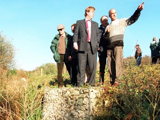 Hugh Becker, chairman of the Regional Fisheries Advisory Committee (centre) looks onto Sprotbrough Flash as water is fed into it just below him after he officially opened the new project, October 28, 1997
