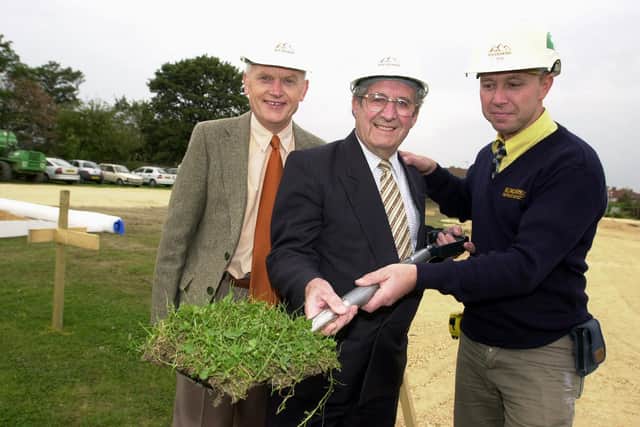 Gordon Gallimore (centre), a trustee of the Cancer Detection Trust for 30 years, digs up the first sod of grass to mark the commencement of phase 2 of the hospice at Balby, watched by John Clark (left), chairman of the Cancer Detection Trust, and helped by Gary Hallam, Wildgoose Construction Ltd's site manager.