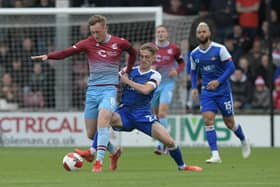 Ethan Galbraith tussles with former Rovers youngster Alfie Beestin. Picture: Howard Roe/AHPIX