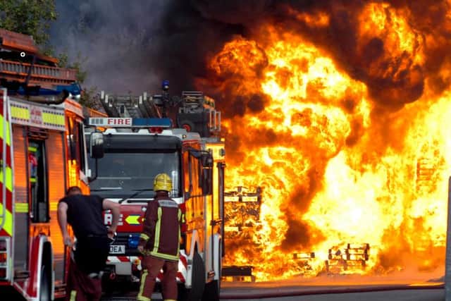 File picture shows South Yorkshire fire fighters in action