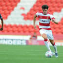 John Marquis in action for Doncaster Rovers.