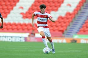 John Marquis in action for Doncaster Rovers.