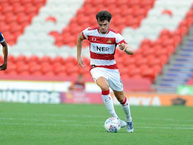 John Marquis in action for Doncaster Rovers.