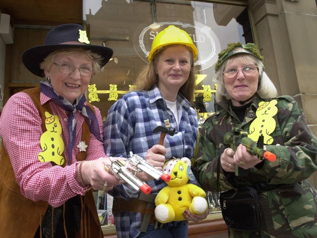 Sheffield Scene staff dressed up as men for Children in need at the shop on Surrey Street, Sheffield. Shop assistants, left to right, Linda Cazzato, Joanne Barker and Fay Jones. back in 2001