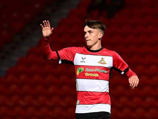 Louie Marsh celebrates his goal for Doncaster Rovers against Everton Under-21s.