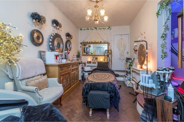 This exceptional home has three receptions, a garden room, summerhouse ...