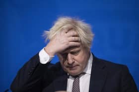 Boris Johnson reintroduces masks after cases of new Omnicron variant of Covid found in UK.