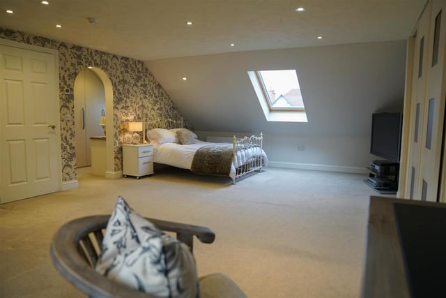 In total, the property boasts five spacious bedrooms and four well-presented bathrooms