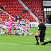 Doncaster's players take the knee before the opening home game of the season against Sutton United.