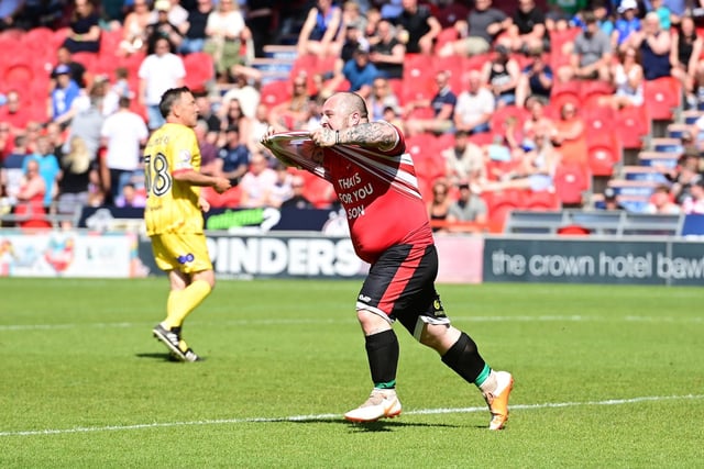 John Drury, one of Doncaster's guest players, pays tribute to his son after scoring against Liverpool.