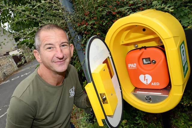 Stuart Royston, Cadeby Parish Meeting treasurer, pictured by where the defibrillator will be located at the side of The Cadeby Pub and Restaurant. Picture: NDFP-04-09-21-Defibrillator 2-NMSY