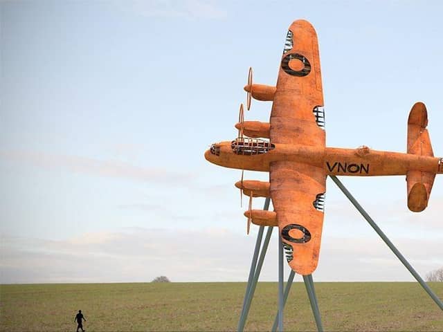 Long-awaited life size sculpture of a Lancaster Bomber erected.