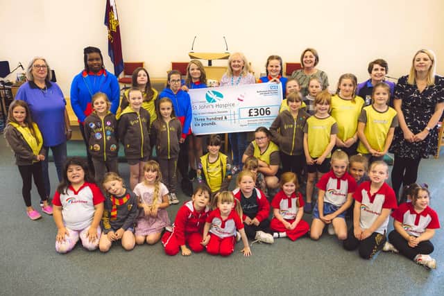 The Doncaster 55th Rainbows, Brownies and Guides are pictured with Lindsay Richards of the hospice.