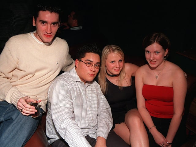 Clayton King, Bobby Arther, Sarah Minger and Hannah Miller, enjoy the night after finishing University exams at the Varsity on West Street in 2003