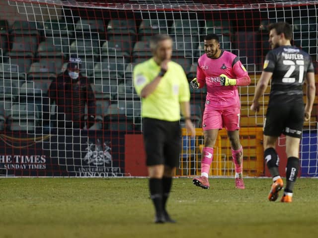 Ellery Balcombe celebrates at the final whistle after Rovers' win over Lincoln City. Picture: Craig Brough/AHPIX