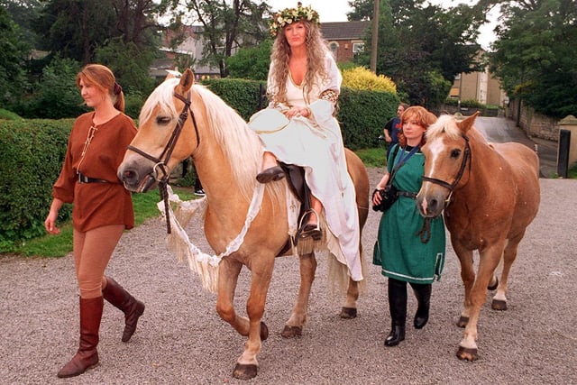 "Medieval" bride Valerie Roe arrives at Conisbrough Castle astride a horse... July 1997