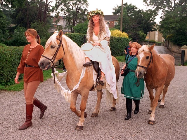 "Medieval" bride Valerie Roe arrives at Conisbrough Castle astride a horse... July 1997